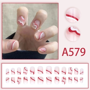 Pink gradient short false nails with red wavy lines and 24 piece set display
