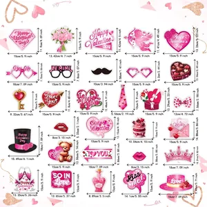 Size chart for 25-piece Valentine's Day party photo booth props with heart-shaped designs