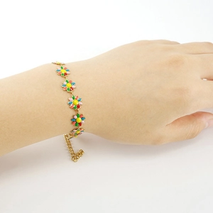 Bracelet en acier inoxydable plaqué or 18K avec breloques fleurs de marguerites colorées