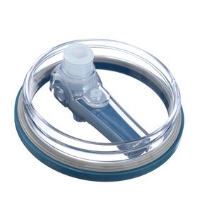 Close-up of a transparent plastic tumbler lid with blue internal straw seal and straw port