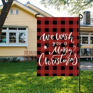 Outdoor linen garden flag featuring red buffalo plaid pattern and Merry Christmas text