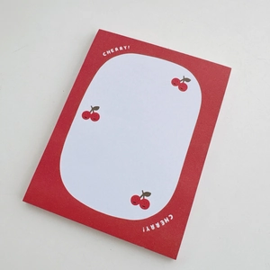 Close-up of cute cherry bear sticky notes with red border and smiling cherry patterns