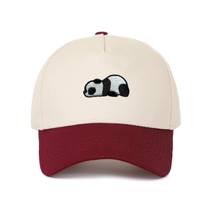 Detailed embroidery of a panda on a beige and burgundy vintage trucker baseball hat