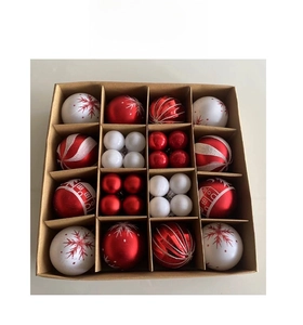 Detail of 24 red and white Christmas ornaments with glitter stripes and snowflake motifs