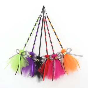 Set of six colorful Halloween witch brooms with mesh bristles and striped handles
