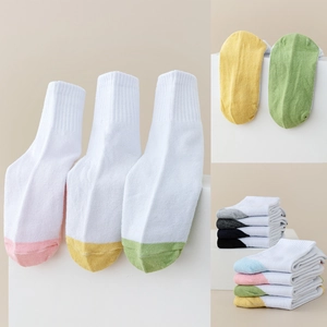 Close-up of breathable mesh cotton socks for children with colorful toe patchwork details