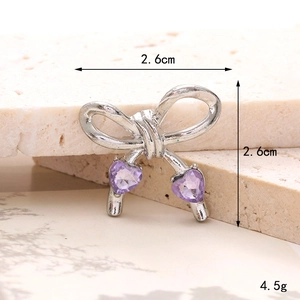 DIY silver bow shoe charm with purple heart crystals and y2k aesthetic for girls