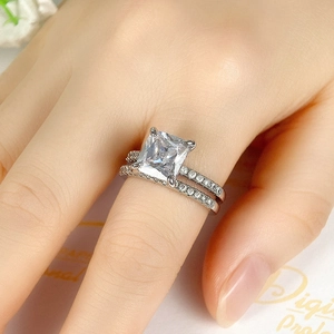 Sparkling princess cut bridal ring set with square diamond and pave cubic zirconia