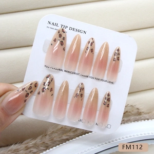Handmade stiletto press-on nails featuring leopard print and pink gradient with glitter