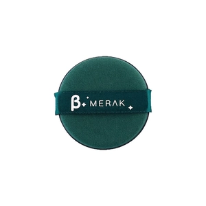 Detail of soft dark green round powder puff with satin ribbon handle and white logo