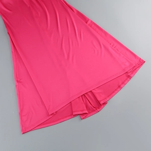 Detail of rose red dress hem featuring double-layered anti-exposure lining and silky fabric