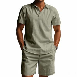 Close-up of sage green linen polo shirt and shorts set with breathable texture