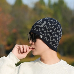 Winter knit beanie with NY monogram and fleece lining for men's outdoor activities