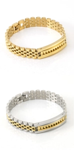 Detailed view of 18K gold and silver stainless steel watch band bracelets on white background