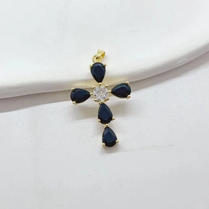 Elegant gold-plated cross pendant with pear-shaped blue zirconia and a center clear stone