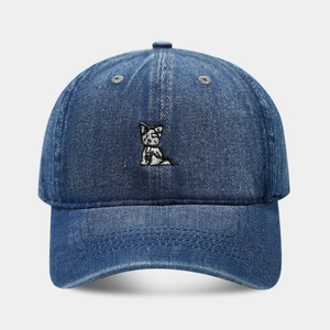 Navy blue denim baseball cap featuring cartoon dog embroidery and soft top design