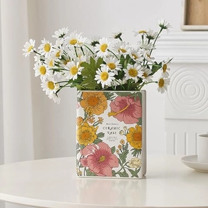 Creative book-shaped white ceramic vase with vintage floral patterns for tabletop decor