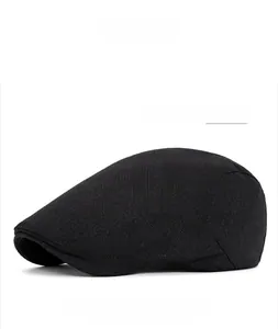 Detail view of the black ivy cap featuring the back button and premium fabric texture