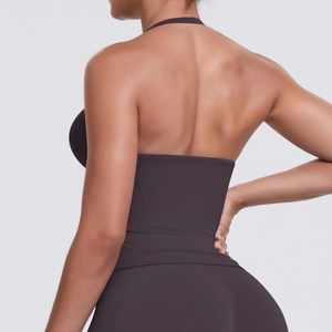 Close-up back view of dark brown halter sports bra showing seamless stretch fabric and open back