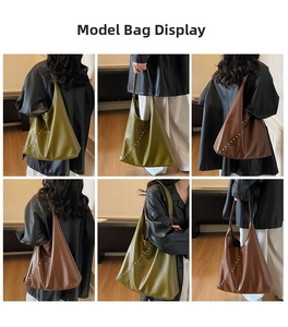 Model wearing olive green and caramel hobo bags with silver rivet side details