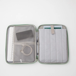 Slim light green tablet sleeve case with multiple pockets for iPad and keyboard