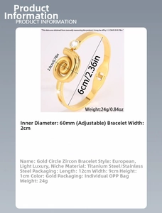 Detailed view of adjustable gold stainless steel spiral bracelet with zircon inlay