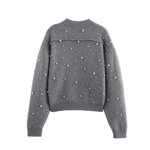 Back view of grey knitted bomber jacket with elegant white pearl embellishments
