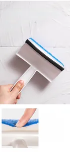 Close-up of dual-layer sponge for foam and ergonomic handle for window cleaning brush