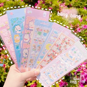 Close-up of cute cartoon bear and bunny PET stickers for scrapbooking and decoration