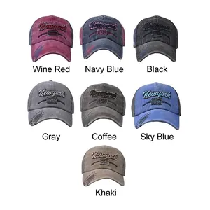 Washed cotton baseball cap with New York 1985 embroidery in seven vintage colors
