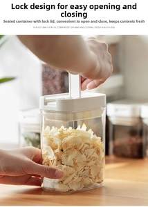 Close-up showing a hand operating the white press-lock lid of a clear airtight storage jar