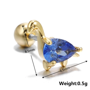 Detailed size view of golden dinosaur stud earring with pear-cut blue gemstone