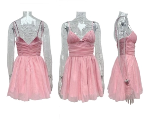 Detailed views of pink mesh mini dress featuring multi-layer tulle and bow decoration