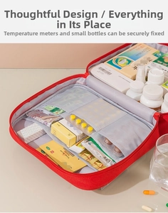 Detailed interior of red first aid kit with multiple mesh pockets and elastic straps