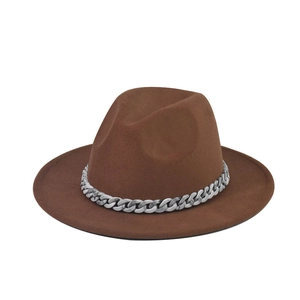 Close-up of a brown wool fedora hat featuring a stylish marble pattern decorative chain