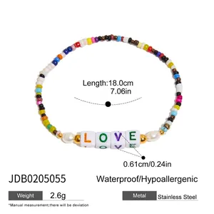 Detail showing LOVE letter beads and pearl bracelet with 18cm stainless steel chain