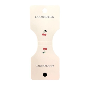 Off-white foldable cardstock hair accessory packaging with cute cherry patterns