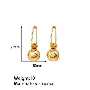 Detailed view of 18k gold plated geometric ball drop earrings made of stainless steel