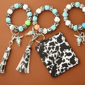 Bohemian Western keychain set with silicone beads, cow print wallet, and bull head charm