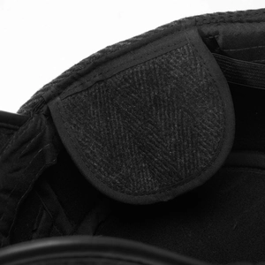 Macro shot of thick thermal lining and elastic strap on winter baseball hat for men