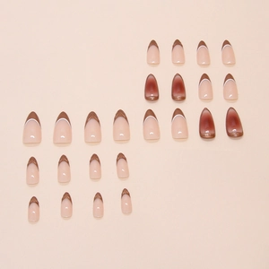 French caramel blush press-on nails set with glossy brown gradient and white tips