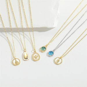 Vintage style necklaces with crown and religious pendants in gold and silver finish