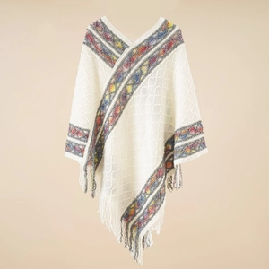 Bohemian knit poncho cape with argyle patterns and white tassel fringe detailing