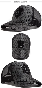 Detail view of plaid truck hat showing grey diamond pattern mesh and R logo patch