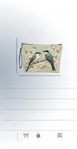 Detail showing dimensions and magpie floral print on a linen cosmetic bag