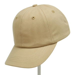 Detail view of khaki cotton twill baseball cap with reinforced stitching and curved brim