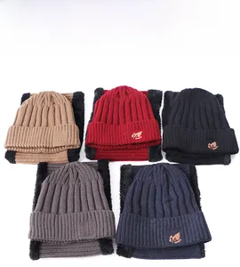 Detail of five winter knit hats and scarves set with warm fleece lining in various colors