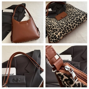 Detail showing high-quality leopard print fabric and silver zipper of hobo tote bag