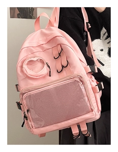 Side view of pink multifunctional backpack featuring mesh pockets and durable straps
