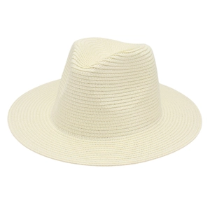 Close-up of the fine woven texture and structured crown on a cream Panama straw hat